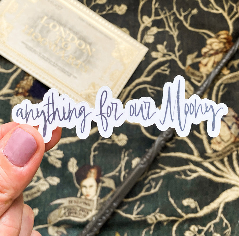 Photo of a white and black sticker with the words 'Anything for our Moony' from the Harry Potter wolfstar fanfiction All the Young Dudes by MsKingBean.